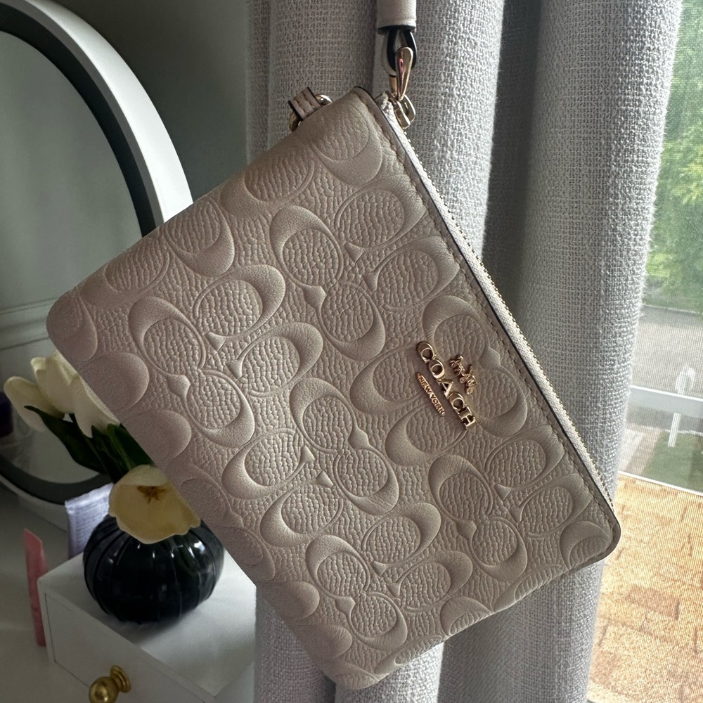 Coach Cream Embossed Leather Wristlet